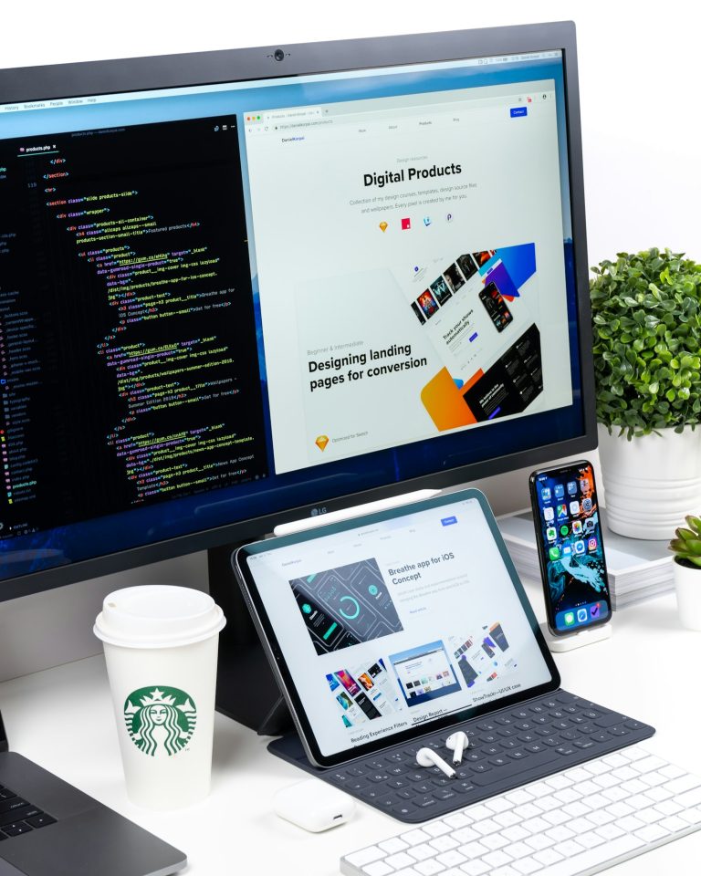 Laptop showing a modern website layout on a desk
